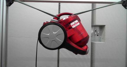 Fig. 1: Optical image of a vacuum cleaner in a semi-anechoic chamber Mikado96_Staubsauger_064